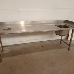 Input-output table dishwasher with sink and clearing hole